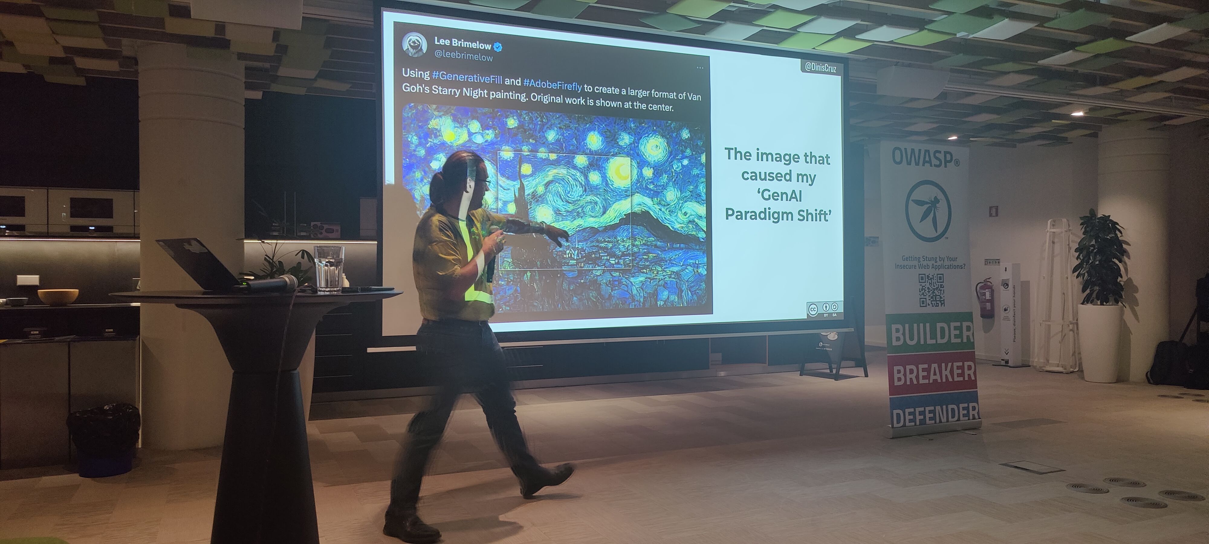 OWASP Lisboa #5 A speaker gesturing towards a slide showing a "Starry Night" image extension generated by AI, discussing a "GenAI Paradigm Shift."
